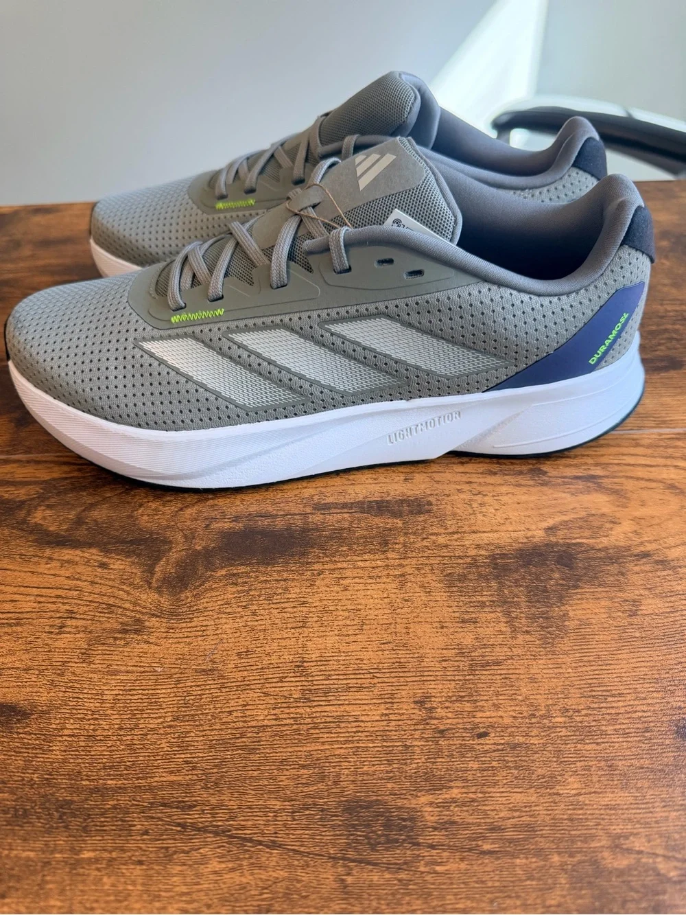adidas Gray Athletic Sneakers with White Stripes